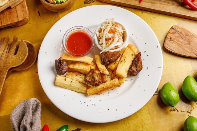 Yuca Con Chicharrón.